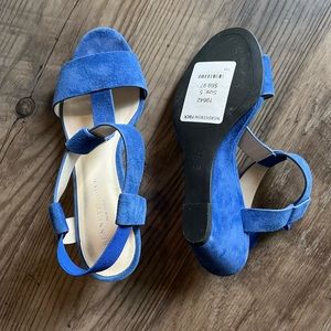 Never worn, stylish blue suede heels.